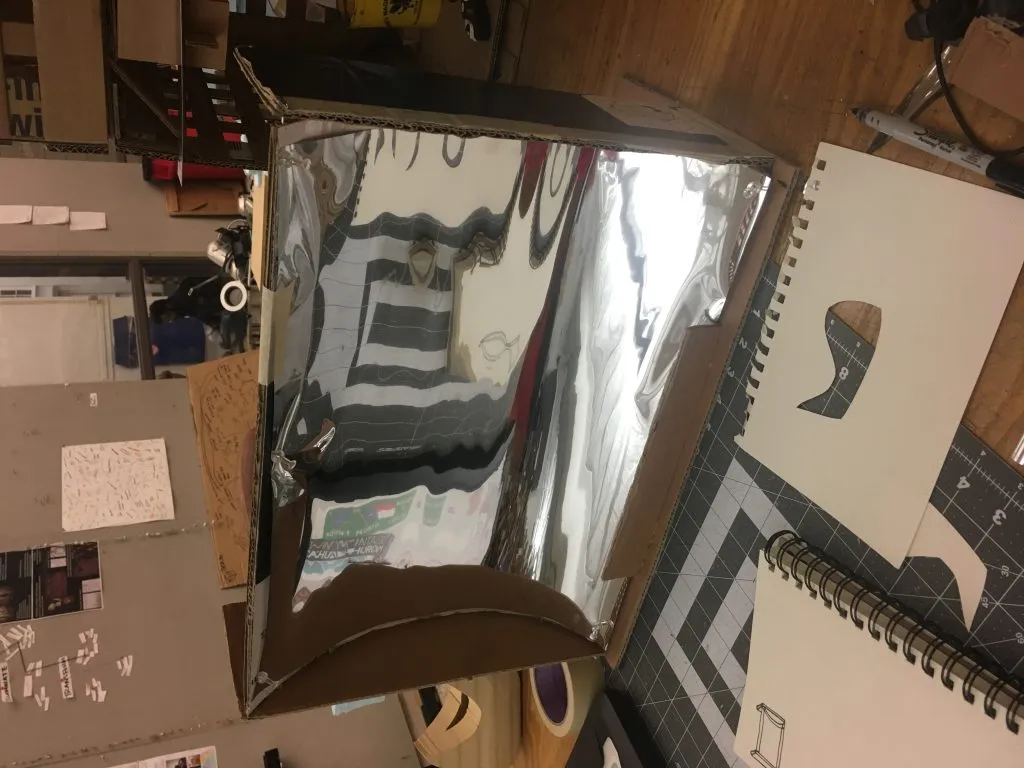 Photo of the darkened box housing the mirror